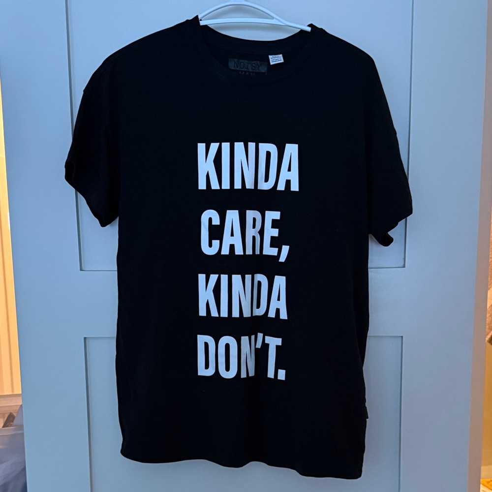 Noisy May Black Tee with White Slogan kinda care, kinda don't
